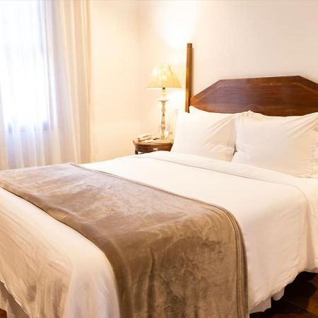 Hotel Solar Do Rosario Оро Прето Екстериор снимка A bed