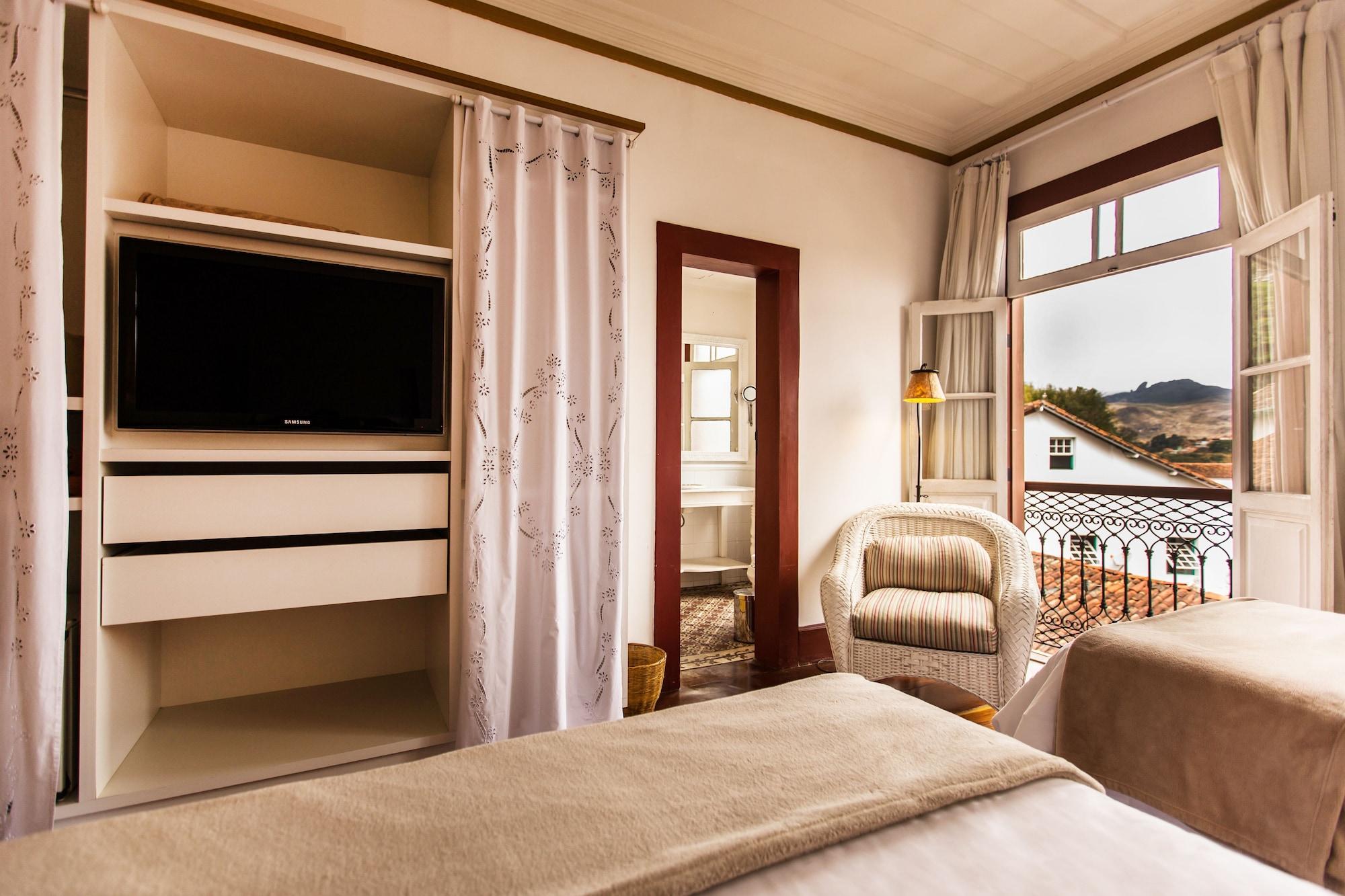 Hotel Solar Do Rosario Оро Прето Екстериор снимка A room at the hotel