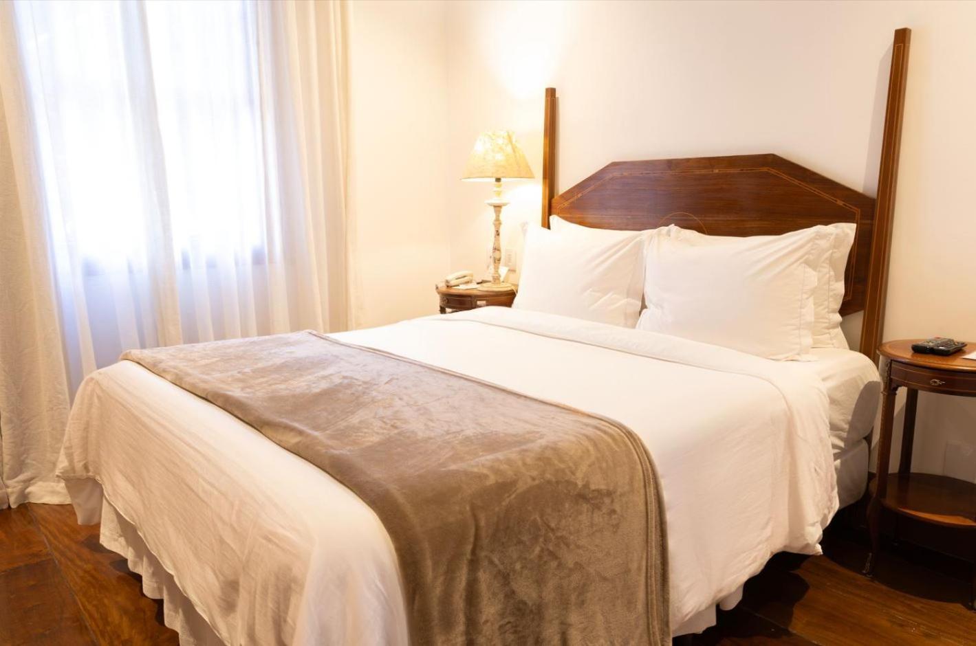 Hotel Solar Do Rosario Оро Прето Екстериор снимка A bed
