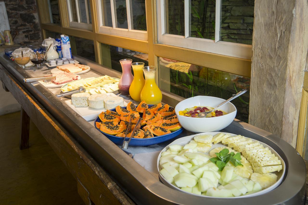 Hotel Solar Do Rosario Оро Прето Екстериор снимка A buffet at a hotel