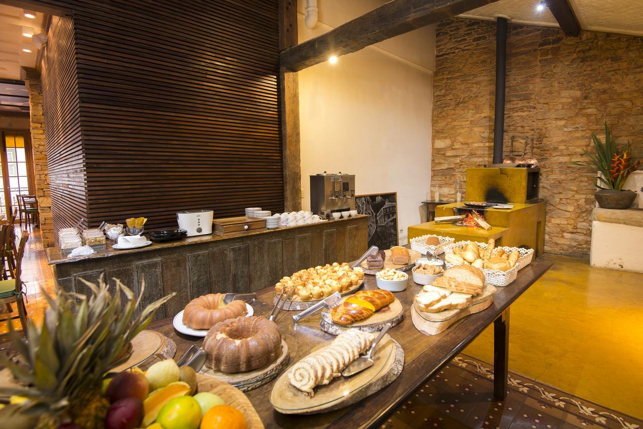 Hotel Solar Do Rosario Оро Прето Екстериор снимка A buffet at a hotel