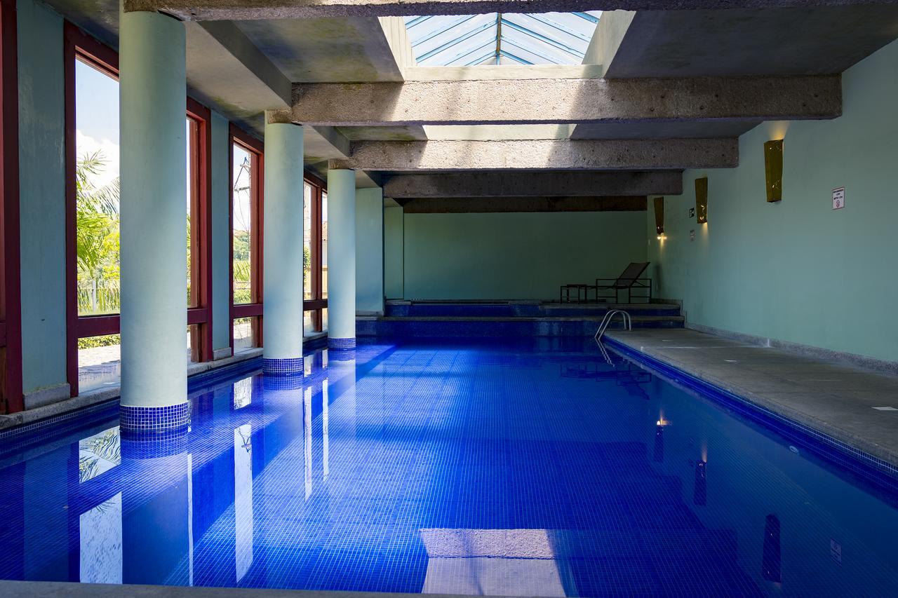 Hotel Solar Do Rosario Оро Прето Екстериор снимка The swimming pool at the hotel